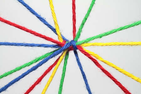 Colorful ribbons create many links and cross each other 