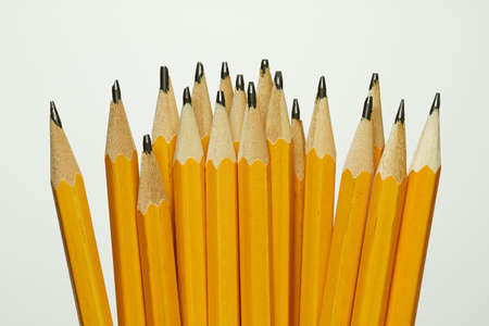 18 new yellow pencils on a light background の写真素材