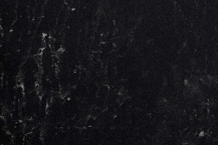 Very dirty black textured surface as background の写真素材