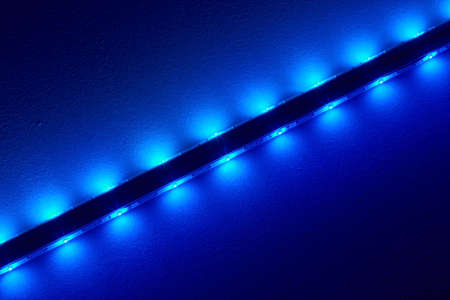 Bright LEDs at a bar illuminate the ceiling.の写真素材
