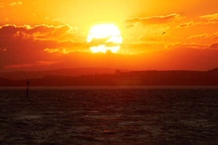 The sun sets over Lake Constance. The sun sets over Lake Constance.