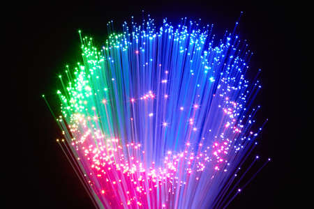 Optical fiber produce in the darkness a circle with Points of Light in the air.