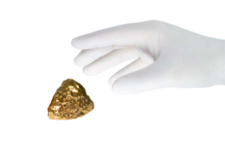 A hand of a gold glove.の写真素材