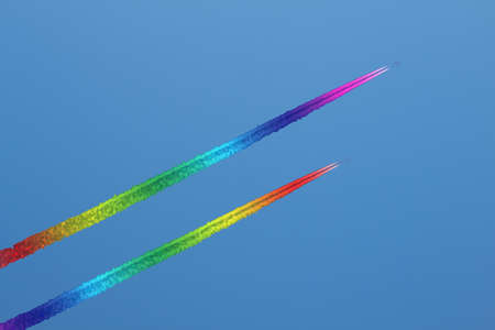 Contrails of airplanes in the blue sky.