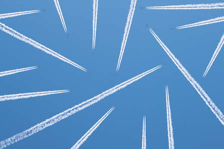 Contrails of airplanes in the blue sky.の写真素材