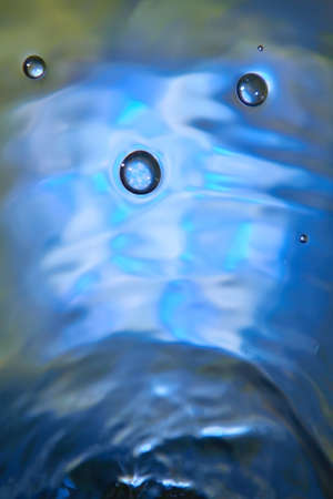 Colored light emitting diodes are under water.