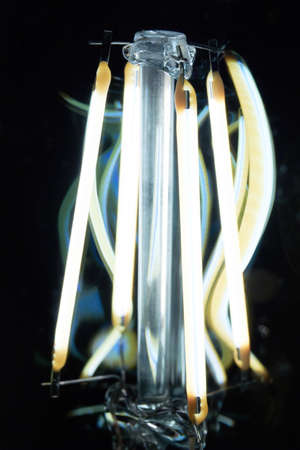 Light-emitting diodes constructed as filament emit bright light.の写真素材
