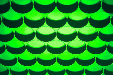 Shady background with small round holes.の写真素材