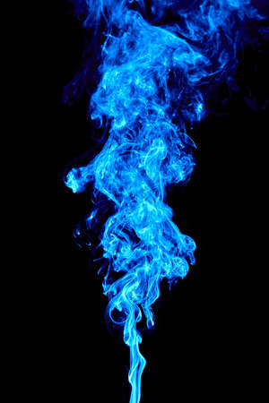 Steam rises vertically and swirls quite strongly.の写真素材