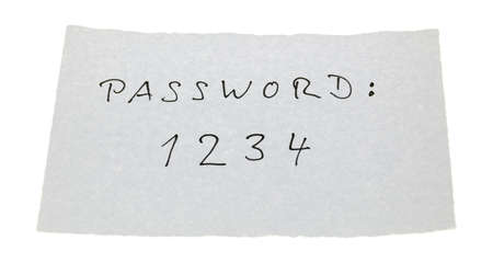 The password 1234 is noted on a small paper sheet.の写真素材