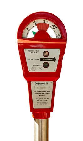 Free standing red parking meter against white background.の写真素材