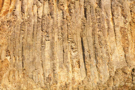 High basalt wall with volcanic origin at the Rhine near Bonn in Germany.