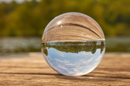 A glass ball lay in the sun on the Ruhr.の写真素材