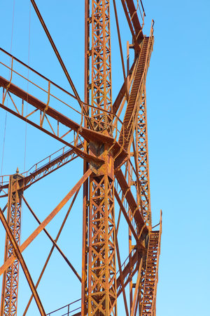 Rusted lattice structure of an old gas tank.の写真素材