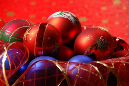 Christmas balls on a red backgroundの写真素材