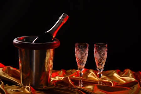 pouring champagne and fireworks on a dark backgroundの写真素材