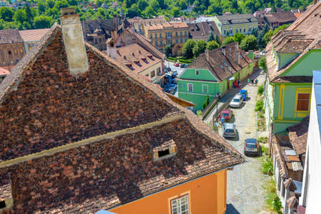 view of the old city from a roof, tile roofs of the historic center, curve twisting streets wind among housesのeditorial素材