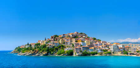 multi-colored houses on the peninsula, fortress at top over the city