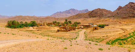 pise-walled village with an oasis in the desert area of Iran, the old abandoned clay houses, the historical settlementの写真素材