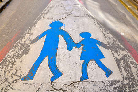 warning sign carefully children drawn on the carriageway, road signsの写真素材