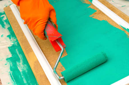 painting carried out by the roller, the master carries out repairの写真素材