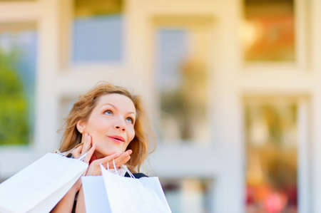 girl dreaming of buying closeup, shoppingの写真素材