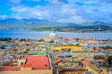 view from the air to the old Cuban port city, a large cruise liner stands at the pierの写真素材