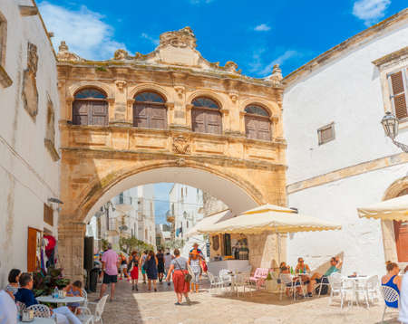 Italy, Ostuni, July 2018 - panorama of the street in the historical part of the cityのeditorial素材