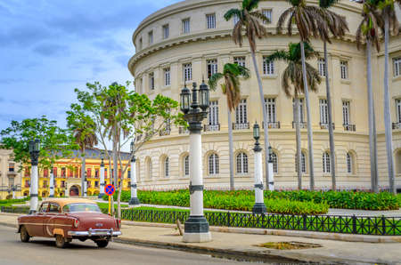 Capitolio building Havana, Cuba with old carsの写真素材