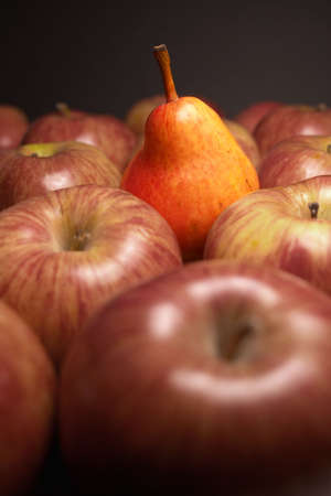 Closeup of pear and apples (one different)の写真素材