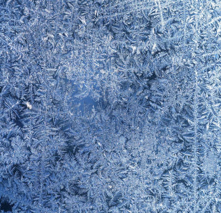 Hoarfrost texture - the patterns made by the frost on the window (hoarfrost background)