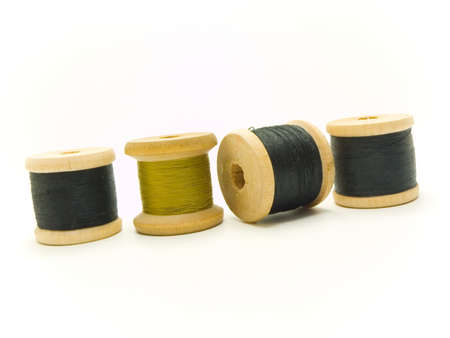 An isolated photo of several colourful threads