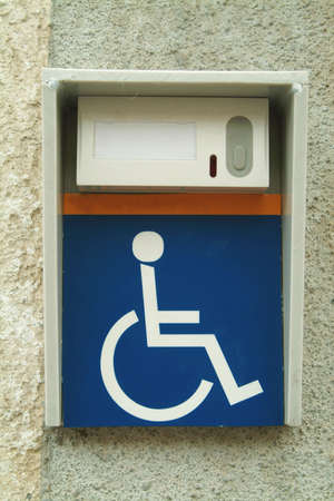 The doorbell for handicap people or people on wheelchair.の写真素材