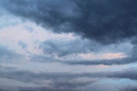 Dark sky. Gray clouds. The evening sky. The sky at sunset