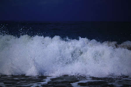 Wave and splashes at night. Sea landscape. Cyprusの写真素材