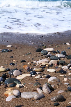 Color pebbles on a sandy beach. Cyprusの写真素材