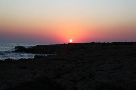Sunset at coastline of Cyprusの写真素材