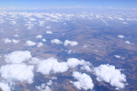 Flight by the plane. Cumulus cloudsの写真素材