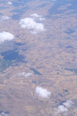Flight by the plane. Cumulus cloudsの写真素材