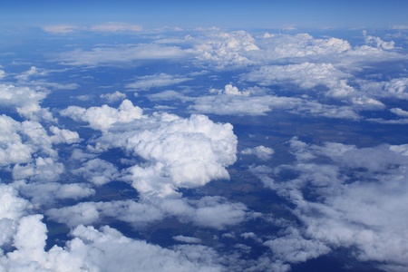 Flight by the plane. Cumulus cloudsの写真素材