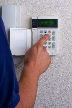 touchpanel to activate the alarm to be activated by a personの写真素材