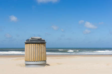 A garbage container on a clean beachの写真素材