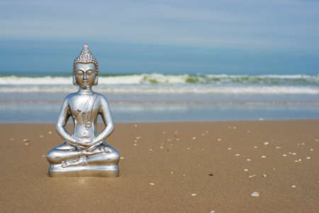 Buddha against a blue skyの写真素材