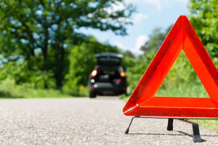A car with a breakdown alongside the road