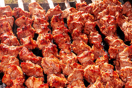 marinated pork chops cut on a spit, fried on charcoal