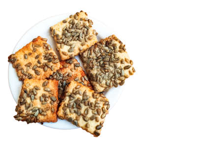 sweet pastries with seeds on a white background