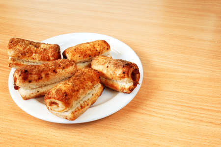 curd biscuit with marmalade filling on a yellow background