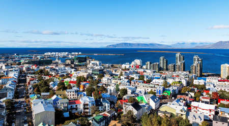 view during the day with colorful houses and mountains in the backgroundの写真素材
