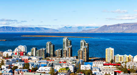 view during the day with colorful houses and mountains in the backgroundの写真素材
