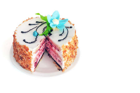 festive round dessert with decoration on a white background with space for textの写真素材